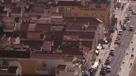 street full of people and houses rooftops of nazare city or village in portugal, everyday life with copy space