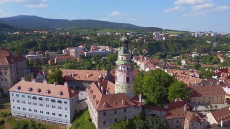 Wonderful-aerial-top-view-flight-tower-in-Krumlov-Cesky-castle-on-the-hill-castlein-in-czech-republic-in-Europe,-summer-of-2023