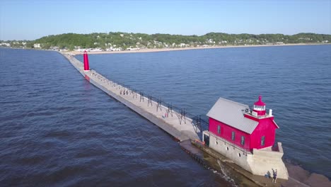 Drone-shot-of-a-lighthouse-in-Grand-Haven,-Michigan