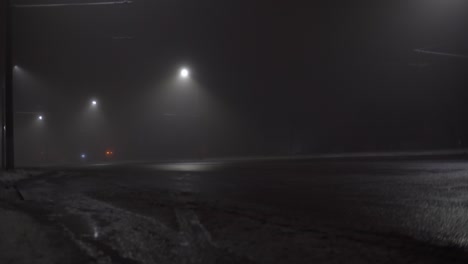 blurred lights of cars on a city street. an empty street, an empty road.