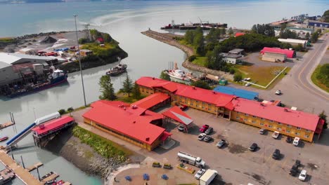 4K-Drone-Video-of-US-Coast-Guard-Station-in-Valdez-Boat-Harbor-in-Valdez,-Alaska-during-Sunny-Summer-Day