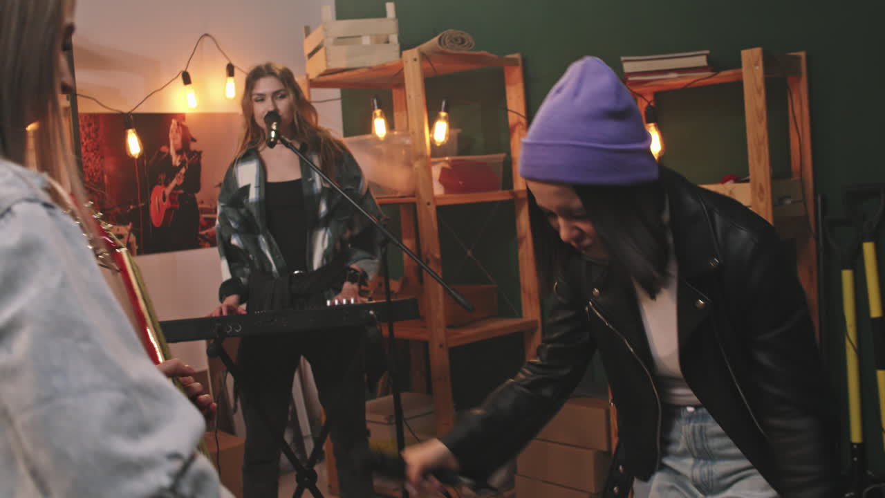 Girl Band Playing Music And Dancing