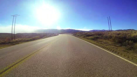 POV-shot-driving-along-a-country-road-at-a-very-fast-speed