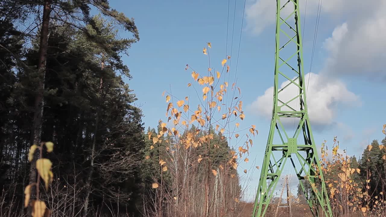 High voltage line with green metallic tower, Green energy concept