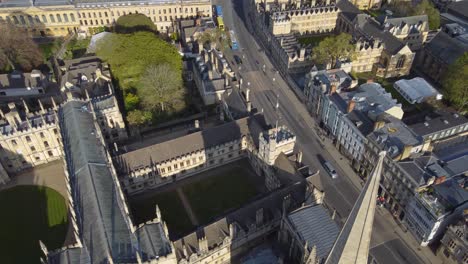 descending aerial past the spire of of the university church of st mary the virgin in oxford