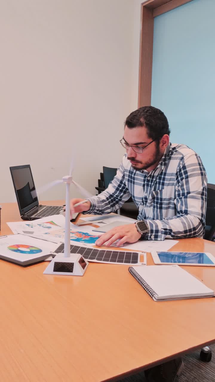 Professional Engineer Analyzing Data for a Renewable Energy Initiative