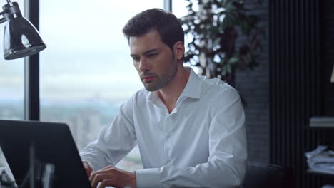 employee typing on computer keyboard