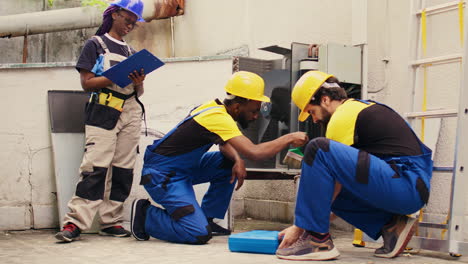 technician cleaning condenser compressor