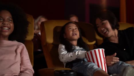 people audience watching movie in cinema theater.