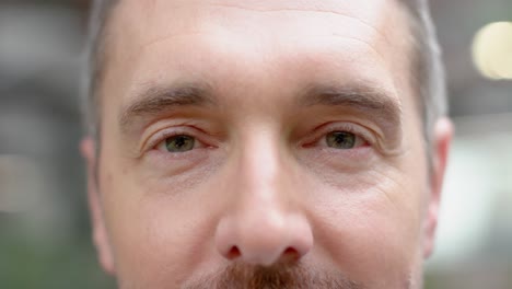 Close-up-portrait-of-eyes-of-caucasian-man-at-office