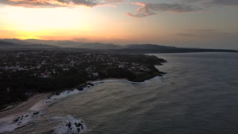 puerto escondido sunrise aerial drone above ocean cliff shore mexico oaxaca sky