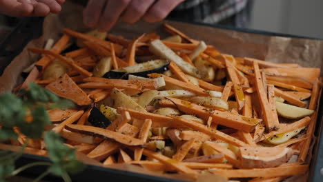 slow-motion footage of a chef spicing vegetables with salt cooking a healthy meal