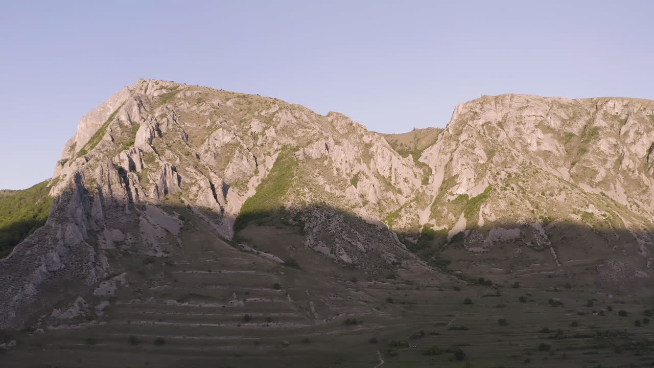 Panoramic view of majestic mountains with shadows on the slopes