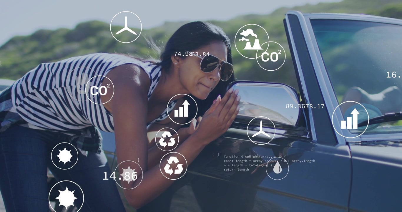 Donna che si sporge dal lato di una decappottabile, controllando lo specchietto per il riverbero e causando grafici animati di CO2 automobilistica