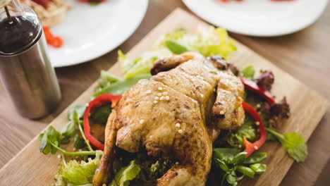 animation of turkey with vegetable salad on countertop in kitchen