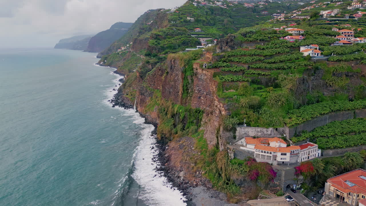 Coastal Landscape with Cliffs and Buildings