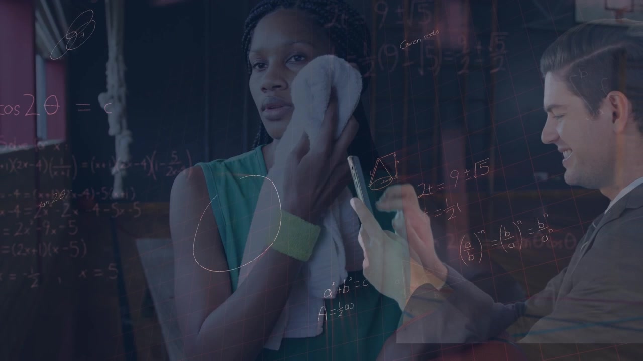 Athlete Wiping Sweat While Man Analyzes Performance Data on Smartphone