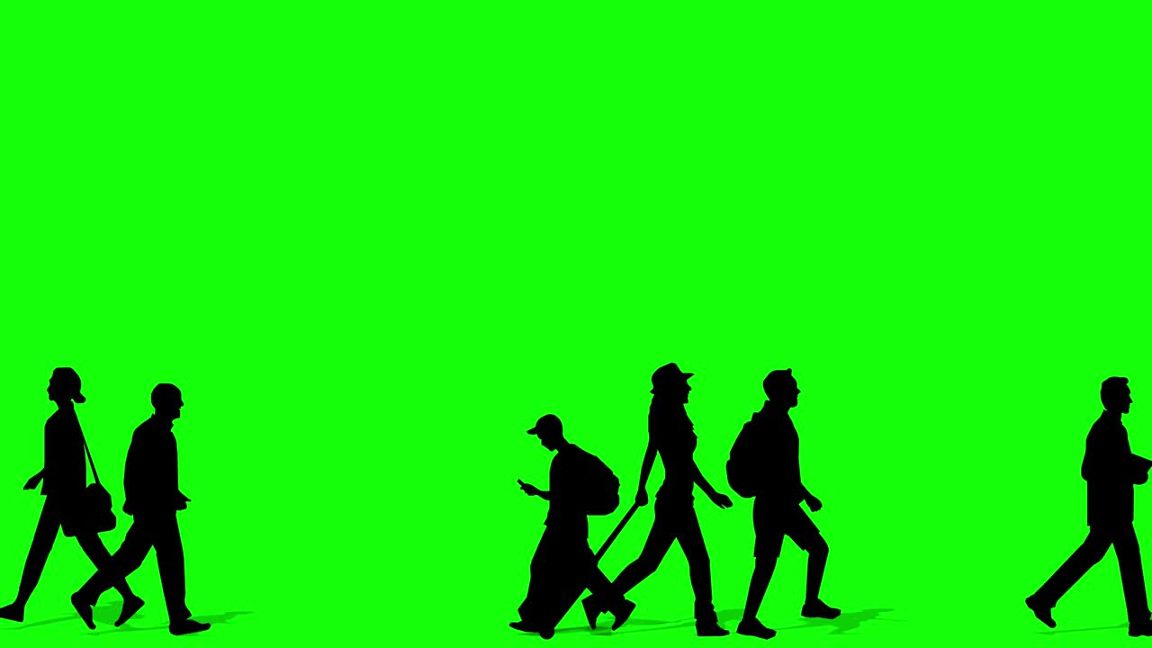 큰 군중이 통과하는 애니메이션 (4k 비디오). 실루 버전. 배경 투명 사용을 위해 녹색 배경