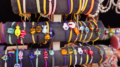 colorful handmade bracelets display at a market