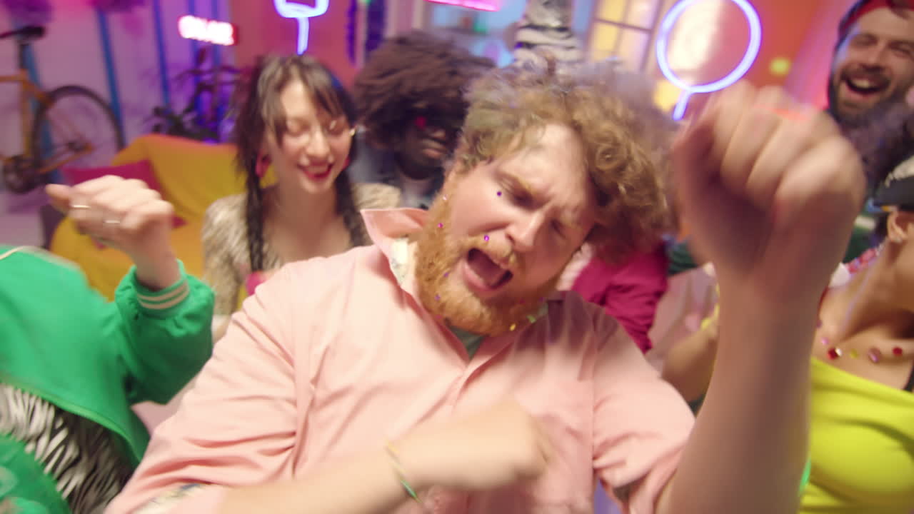 POV of Tipsy Man Dancing and Singing at Party with Friends