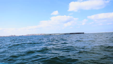 Sailing-in-the-sea-under-the-cloudy-sky---push-in