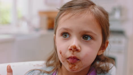 messy, chocolate and face of girl in kitchen