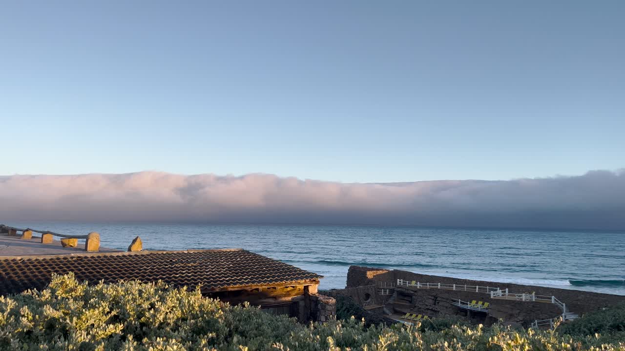Dam on the edge of the beautiful sea where surfing