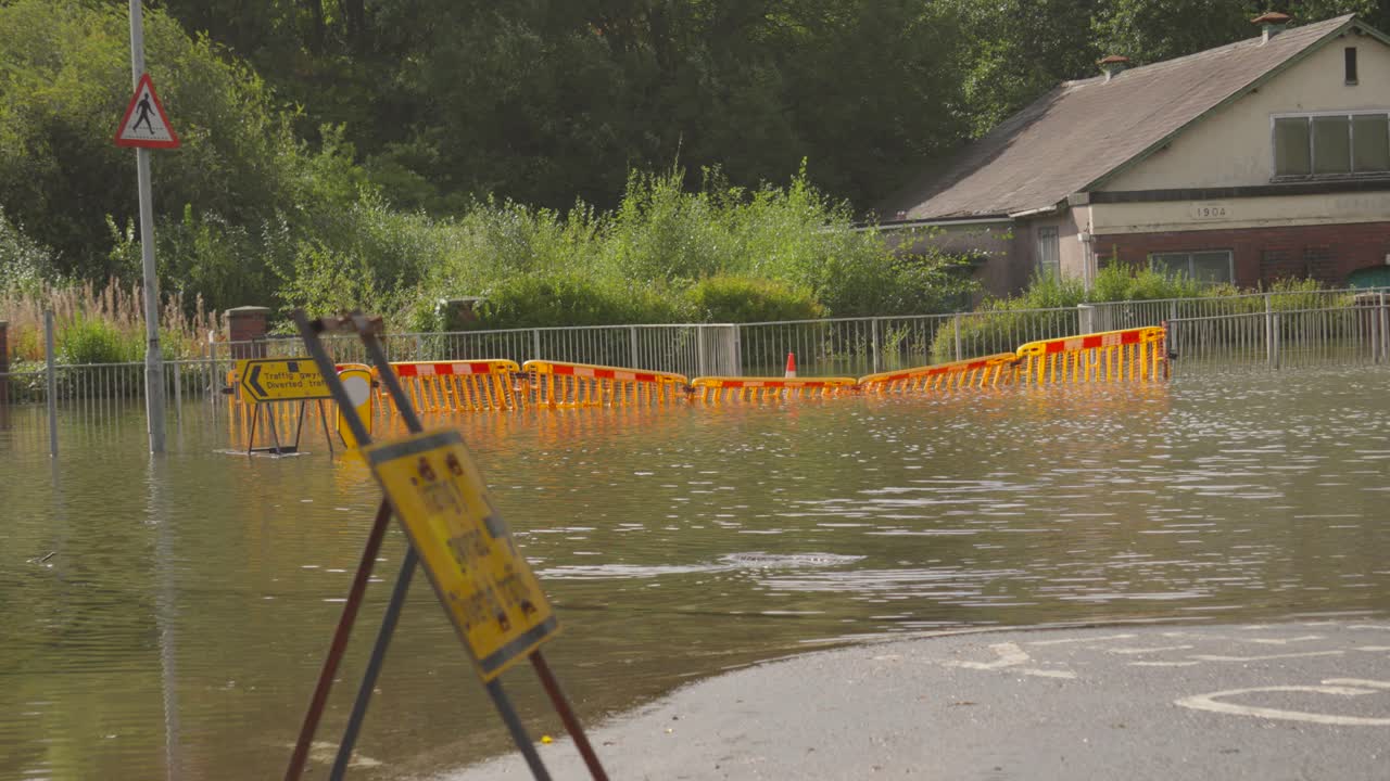Flooded Road and House