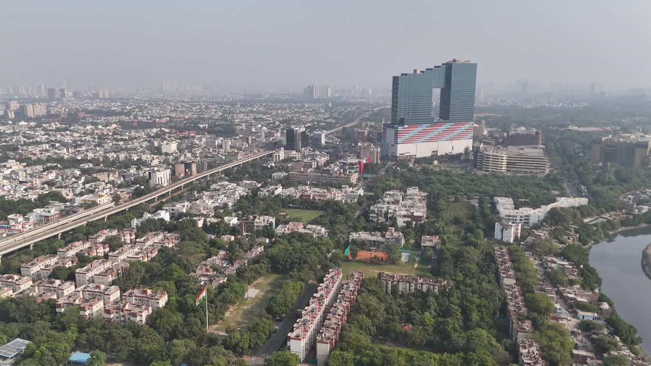 Drone footage capturing Noida’s expanding skyline and well-planned roadways surrounded by residential and commercial spaces