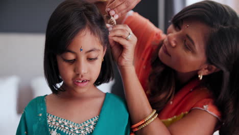 mother and daughter getting ready for a celebration