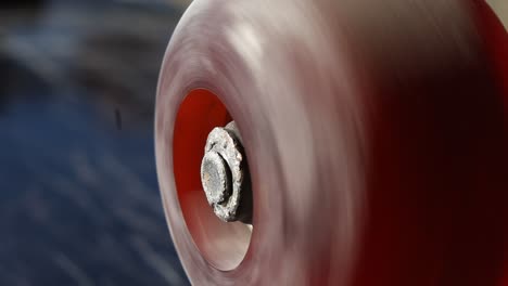 close up of skateboard wheel spinning to a stop extreme sports