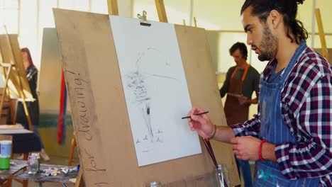 man drawing sketch on canvas 4k
