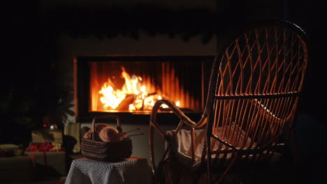 rocking chair and a set for knitting by the fireplace nice evening at home