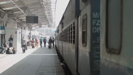 a bird lands on the train window at an  train station in jodhpur india