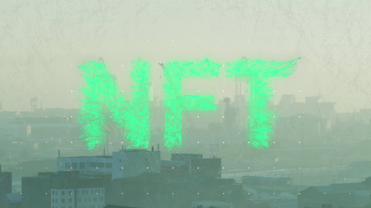 Animation of nft text banner against aerial view of cityscape