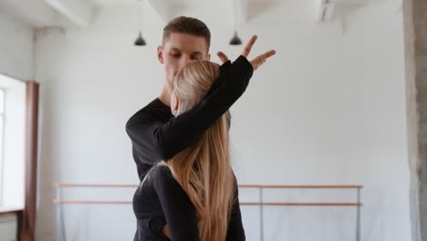 dancers practicing in a bright studio