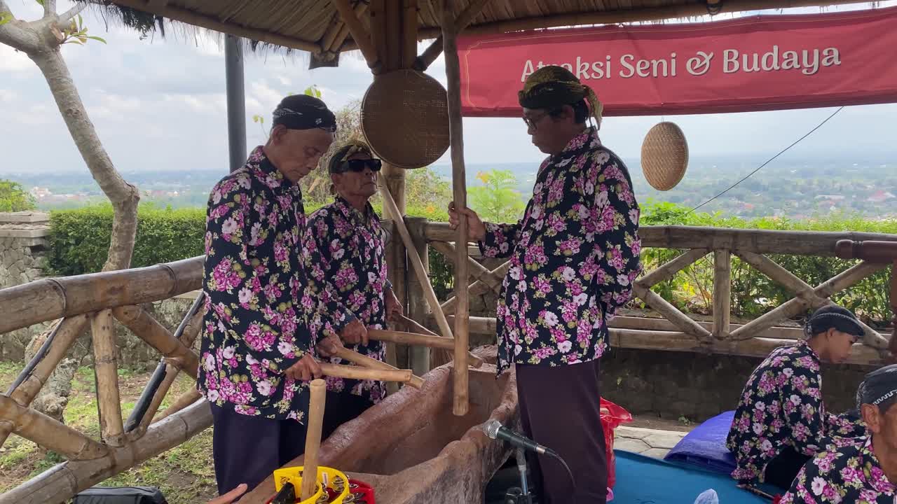 Raw recording of playing Gejog Lesung, a traditional art form of playing percussion instruments using traditional rice pounding tools, lesung and antan.