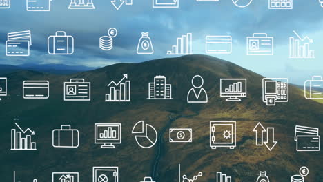 Animating business and financial icons over mountainous landscape