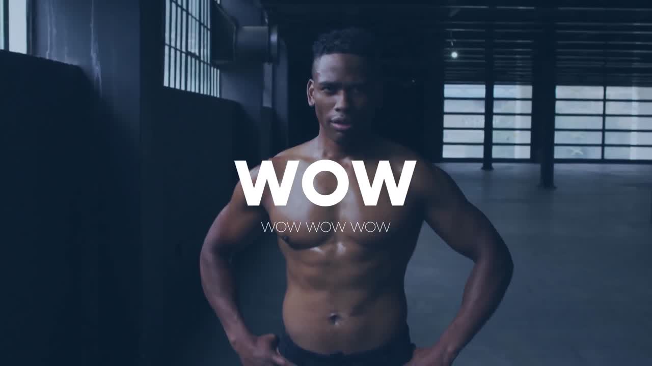 혼성 인종 남자가 근육을 휘두르는 와우 텍스트의 애니메이션