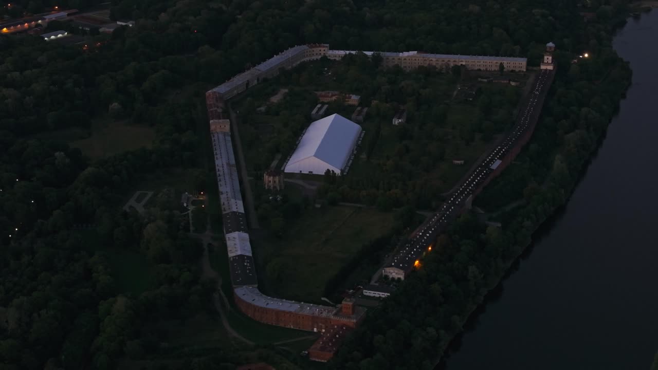 Cinematic night shot Modlin Fortress walls and river location near Warsaw Poland