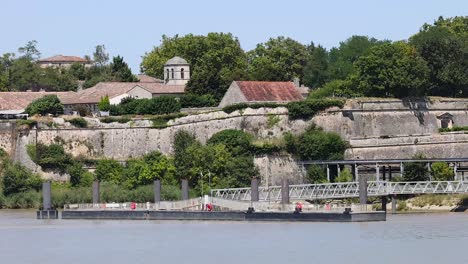 historic buildings along the river in blaye