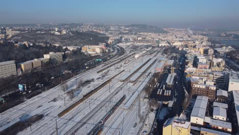 Smichov-railway-station-in-Prague,-Czech-Republic,-aerial-drone-view,-winter-sunny-day