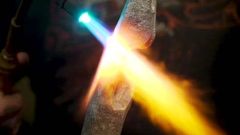 blacksmith metal forging in 120fps slow motion