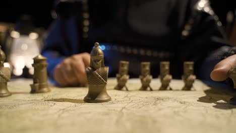 Use-of-historical-maps-and-chess-pieces-in-the-Middle-Ages.