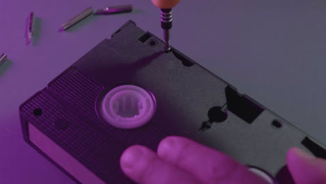 vhs cassette on purple background