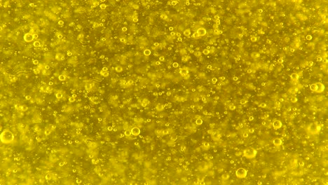 burbujas de agua detrás del fondo de vidrio