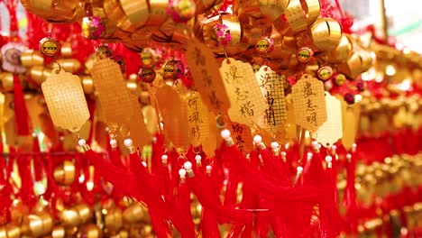 hanging golden bells with red tassels in hong kong