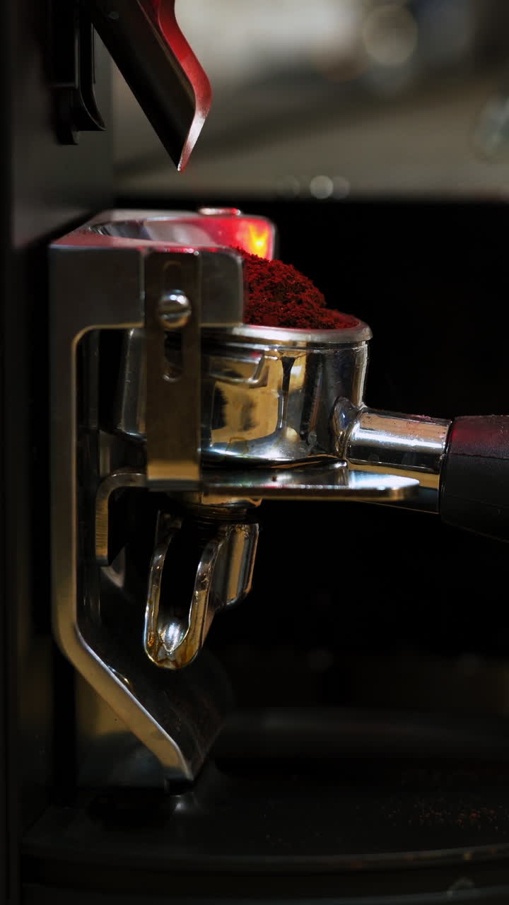 Barista making a cup of coffee. Making cup of coffee in coffee machine