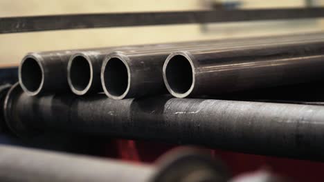 pipe factory. metal pipes on the conveyor line