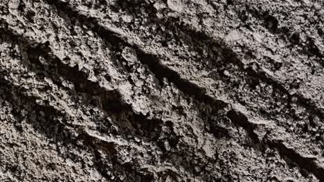 A-closeup-of-the-soil-at-the-dirt-race-track,-commonly-utilised-for-horse-racing-events-worldwide